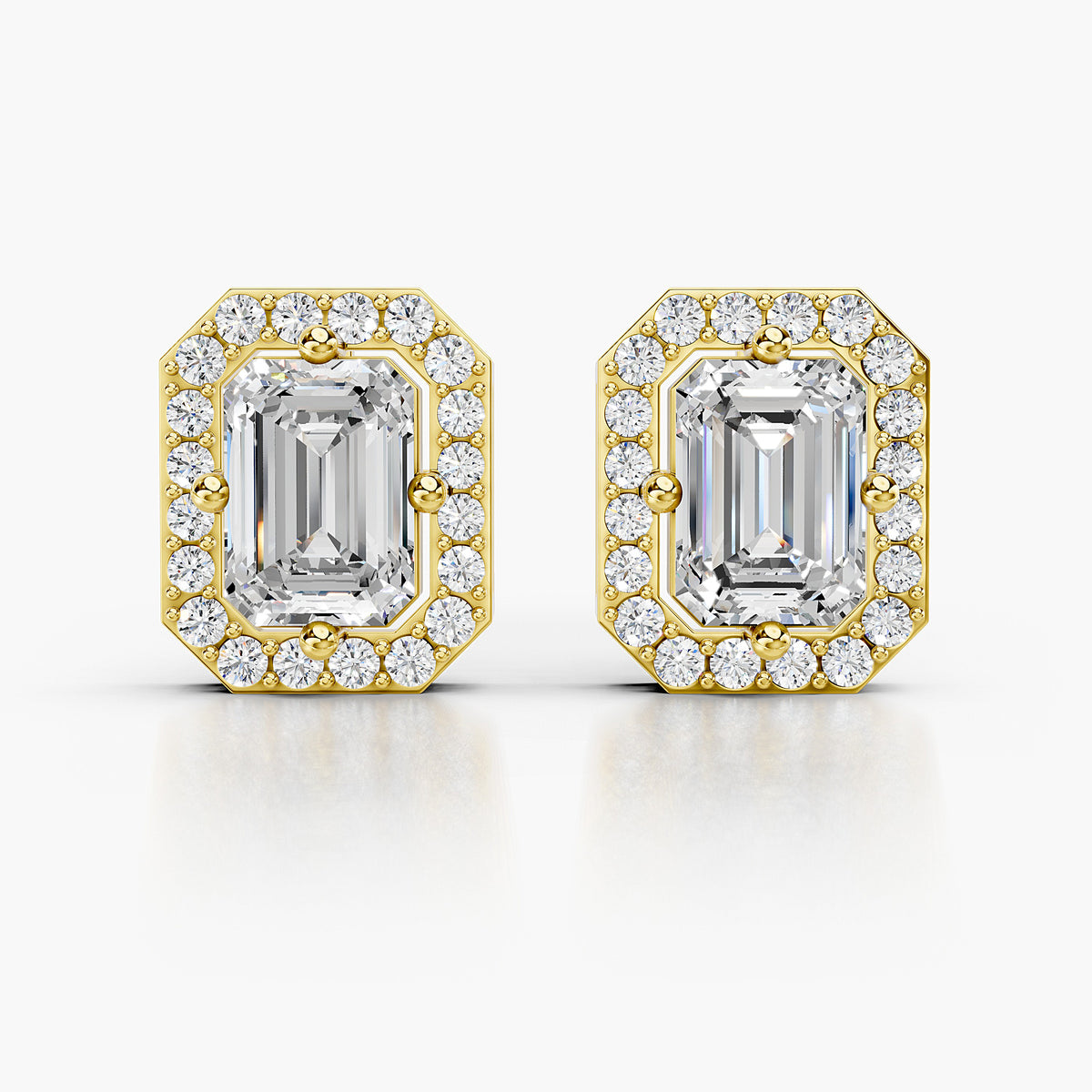 Emerald-cut diamond Halo earrings with a luxury finish
