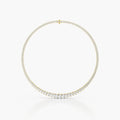 Bromley Marquise Tennis Necklace showcasing a continuous line of brilliant round diamonds in a sleek gold framework.